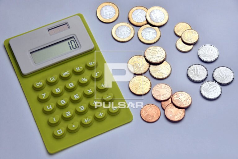 calculo de impostos com calculadora e moedas